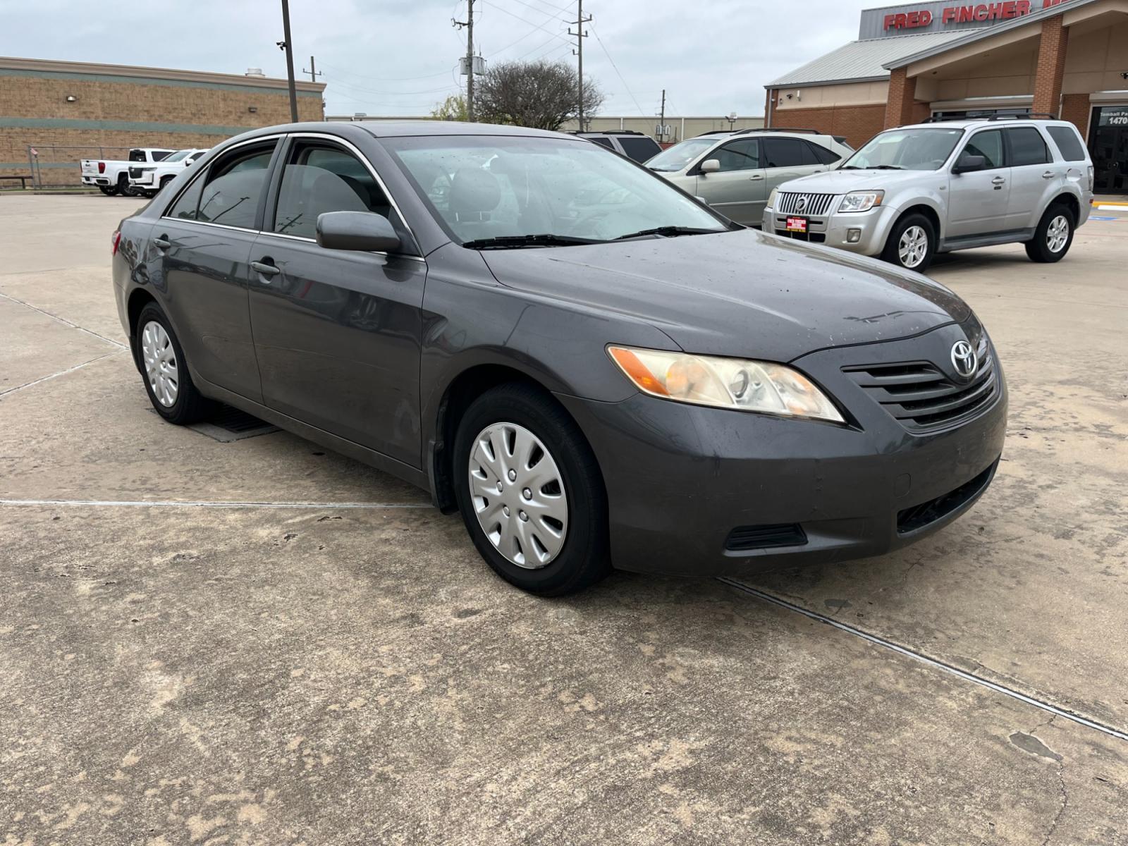 2007 GRAY /gray Toyota Camry CE 5-Spd AT (4T1BE46K37U) with an 2.4L L4 DOHC 16V engine, 5-Speed Automatic Overdrive transmission, located at 14700 Tomball Parkway 249, Houston, TX, 77086, (281) 444-2200, 29.928619, -95.504074 - Photo #0
